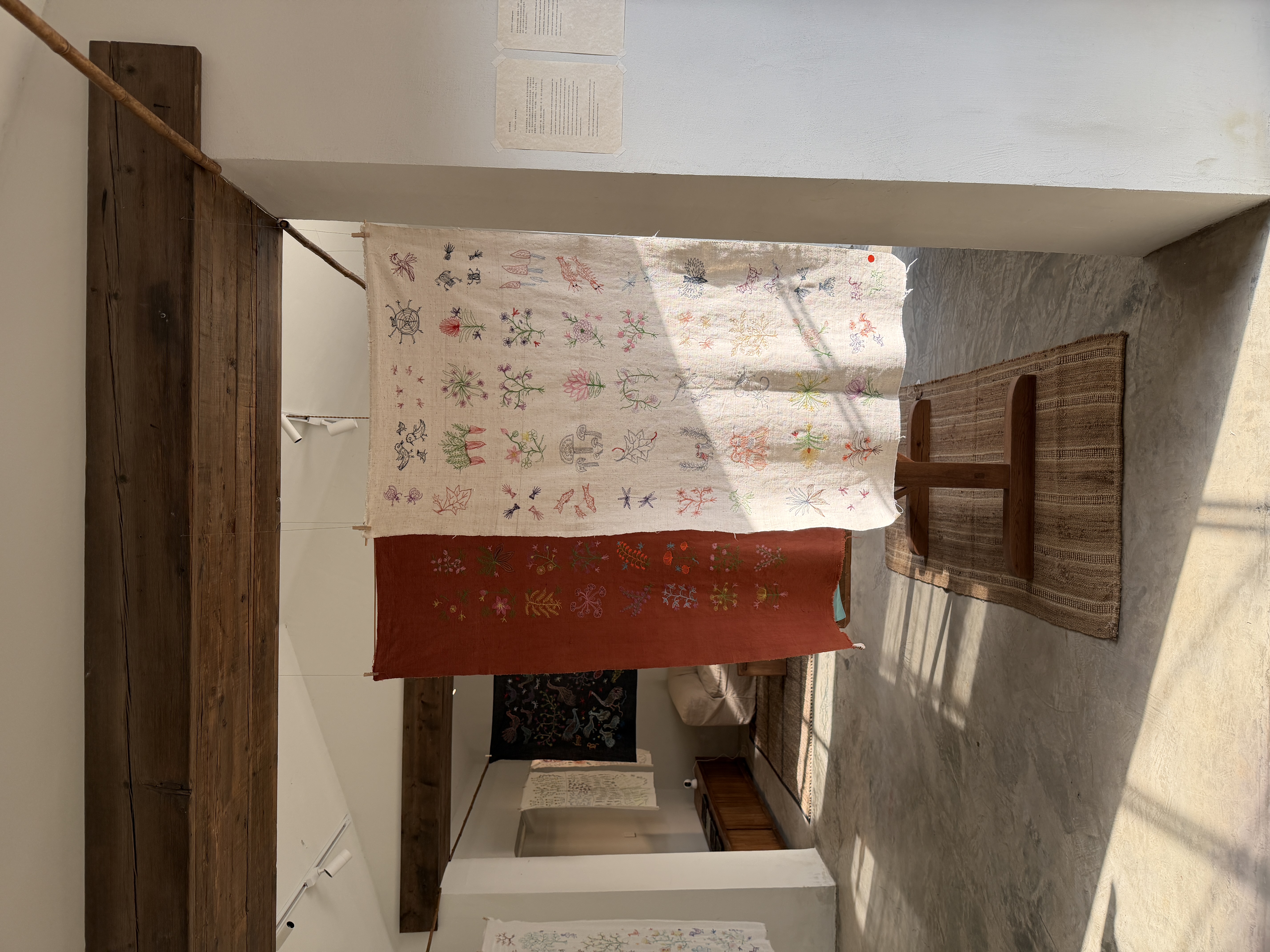 At Qiushe Garden in Beijing, the embroidery of Grandma Xiancao intertwines with light and shadow, bringing the subtle textures of daily life into clear focus. /CGTN