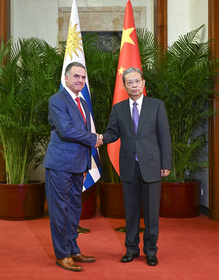 China's top legislator, Zhao Leji (R), meets with Uruguayan President Yamandu Orsi in Beijing on February 3, 2026. /Xinhua