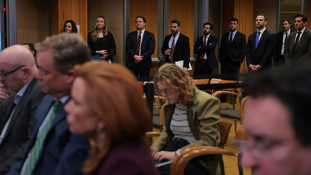 Department of Justice (DOJ) employees attend a news conference to announce the update on the Epstein files at the DOJ in Washington, D.C., U.S., January 30, 2026. /VCG