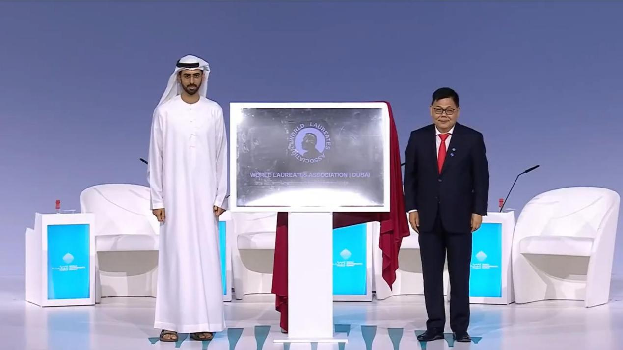 UAE Minister of State for Artificial Intelligence Omar Sultan Al Olama and Wang Hou, executive director and secretary-general of the World Laureates Association, inaugurate the WLA Dubai regional hub on Feb. 3. /CGTN