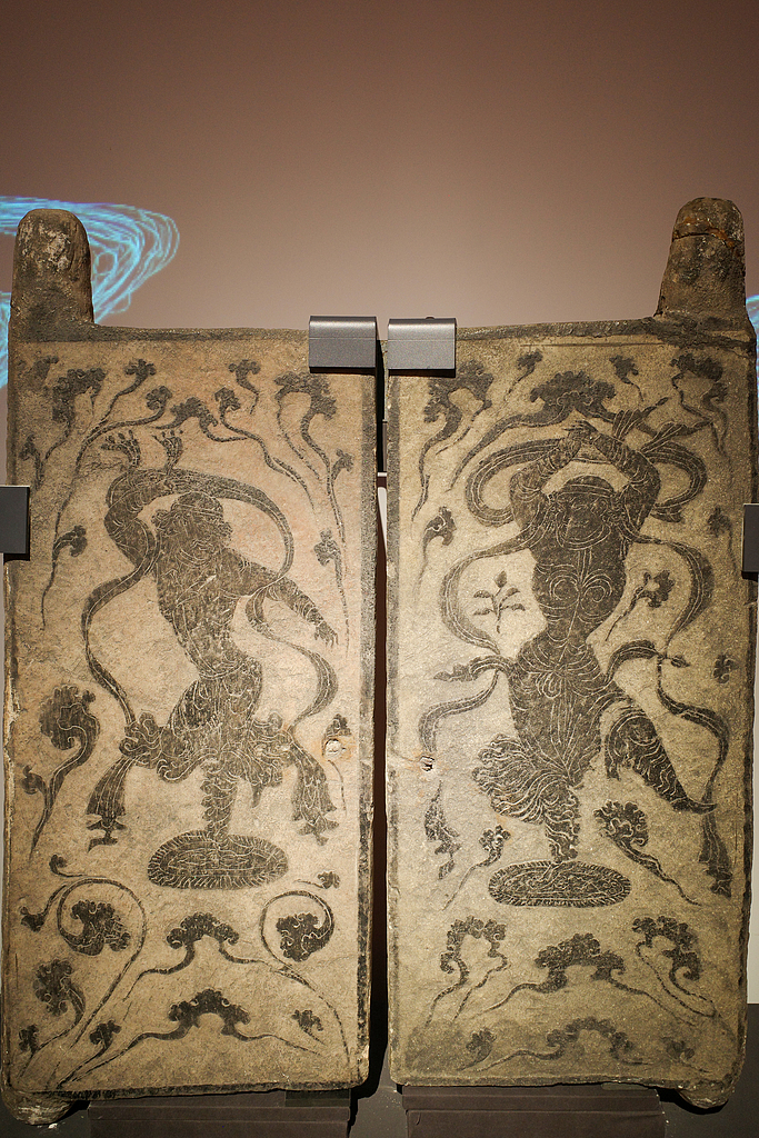 Stone tomb doors carved with Hu Xuan dancers, Ningxia Hui Autonomous Region, northwest China. /CFP