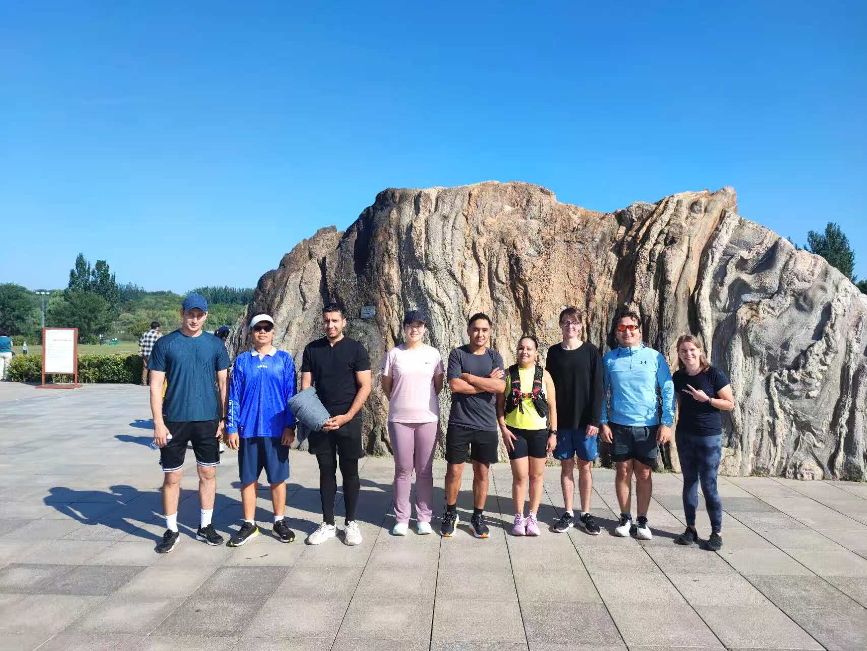 A community running group gathers at Beijing’s Olympic Park, where 