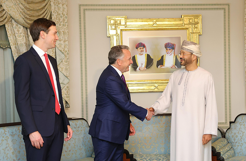 In this photo released by Oman's Foreign Ministry, U.S. special envoy Steve Witkoff (C) shakes hands with Omani Foreign Minister Sayyid Badr bin Hamad Al Busaidi (R) as Jared Kushner, U.S. President Donald Trump's son-in-law, looks on during a meeting in Muscat, Oman, February 6, 2026. /VCG