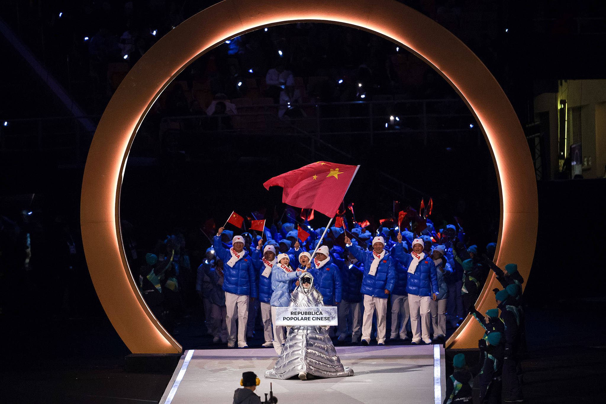Co-flagbearers Zhang Chutong and Ning Zhongyan lead China's delegation in the Parade of Nations during the opening ceremony at the 2026 Milano Cortina Winter Olympics in Milan, Italy, February 6, 2026. /VCG