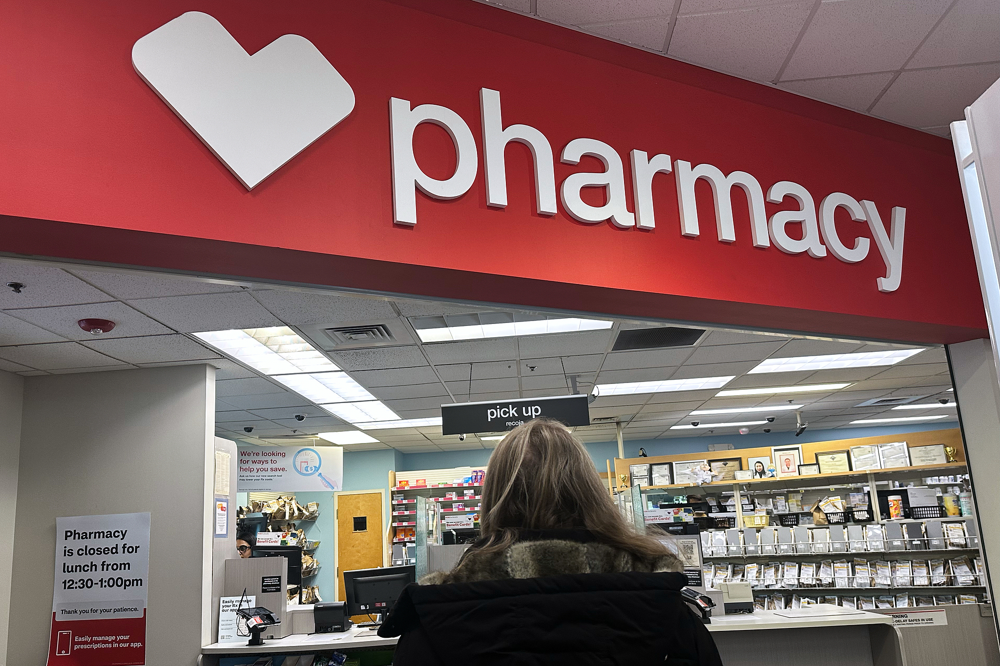 A person waits to pick up medications at a drug store in Buffalo Grove, Illinois, January 7, 2026. /CFP