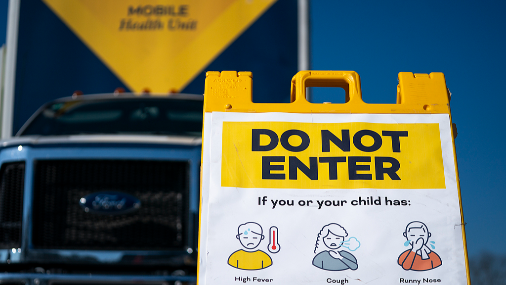 A sign warning patients sits outside a mobile clinic offering free measles vaccinations in Spartanburg, South Carolina, the United States, on February 6, 2026. /CFP