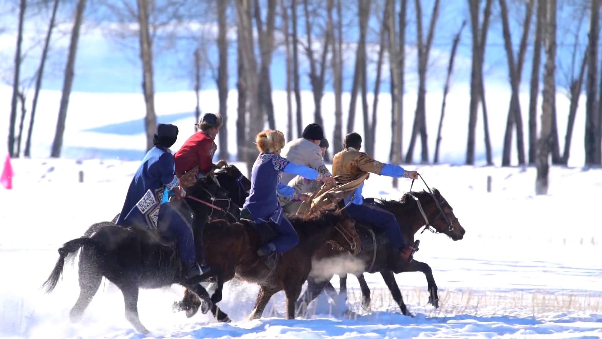 Local herdsmen participate in a winter horse run, a major attraction for visitors to northwest China. /CMG