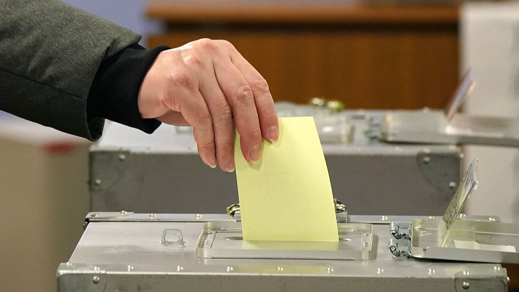 A voter casts his ballot at a polling station for the Lower House election in Tokyo, Japan, February 8, 2026. /VCG
