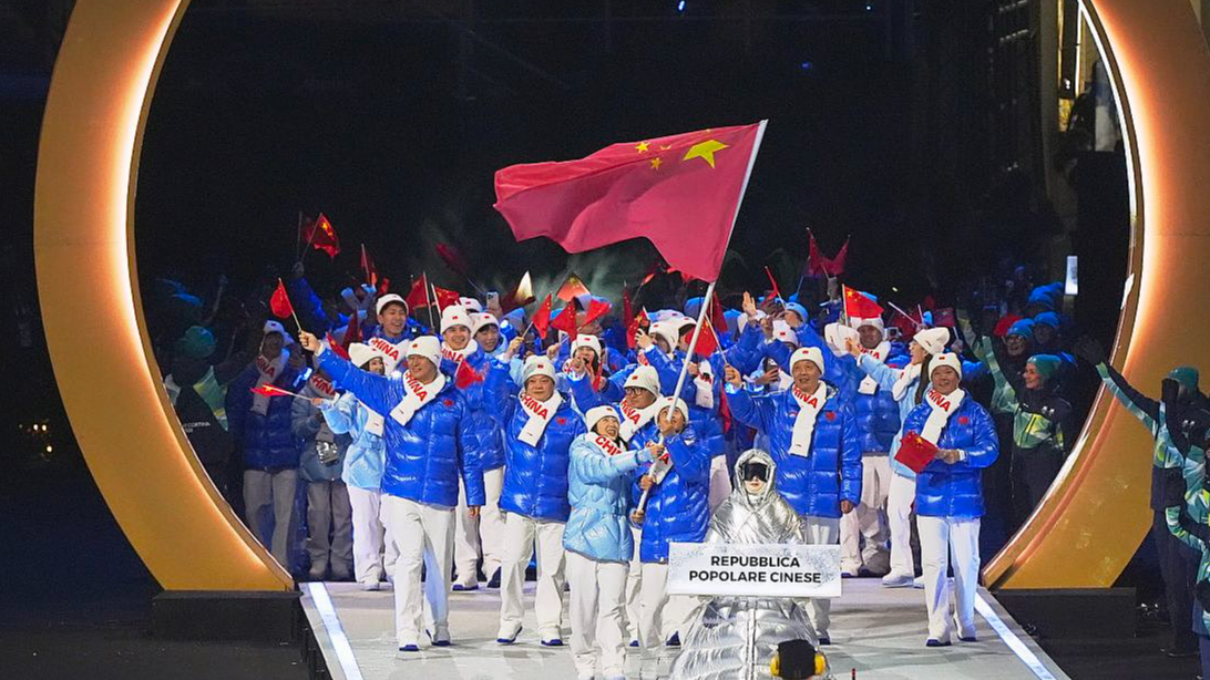 Chinese athletes enter the stadium during the opening ceremony of the 2026 Milano-Cortina Winter Olympics at San Siro Stadium on February 6, 2026. /VCG