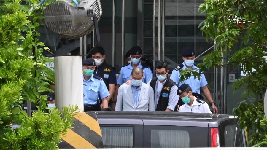 Jimmy Lai is taken by the police to the headquarters of Apple Daily for investigation in Hong Kong, south China, August 10, 2020. /Xinhua