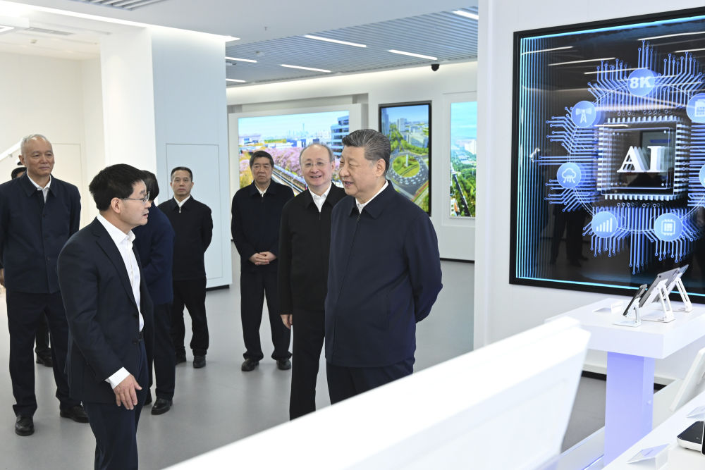 Chinese President Xi Jinping (R), also general secretary of the Communist Party of China Central Committee and chairman of the Central Military Commission, visits an information technology innovation park in Beijing, China, February 9, 2026. /Xinhua