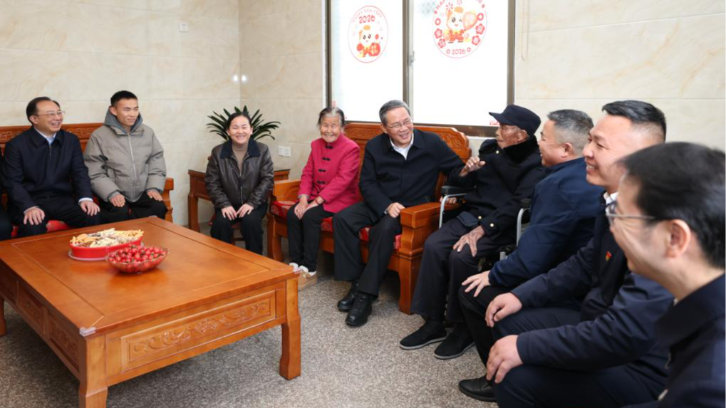 Chinese Premier Li Qiang, also a member of the Standing Committee of the Political Bureau of the Communist Party of China Central Committee, talks with veteran Guo Shixun, a Red Army soldier's descendant, in Zhufang Village, Yeping Town of Ruijin City, east China's Jiangxi Province, February 10, 2026. /Xinhua