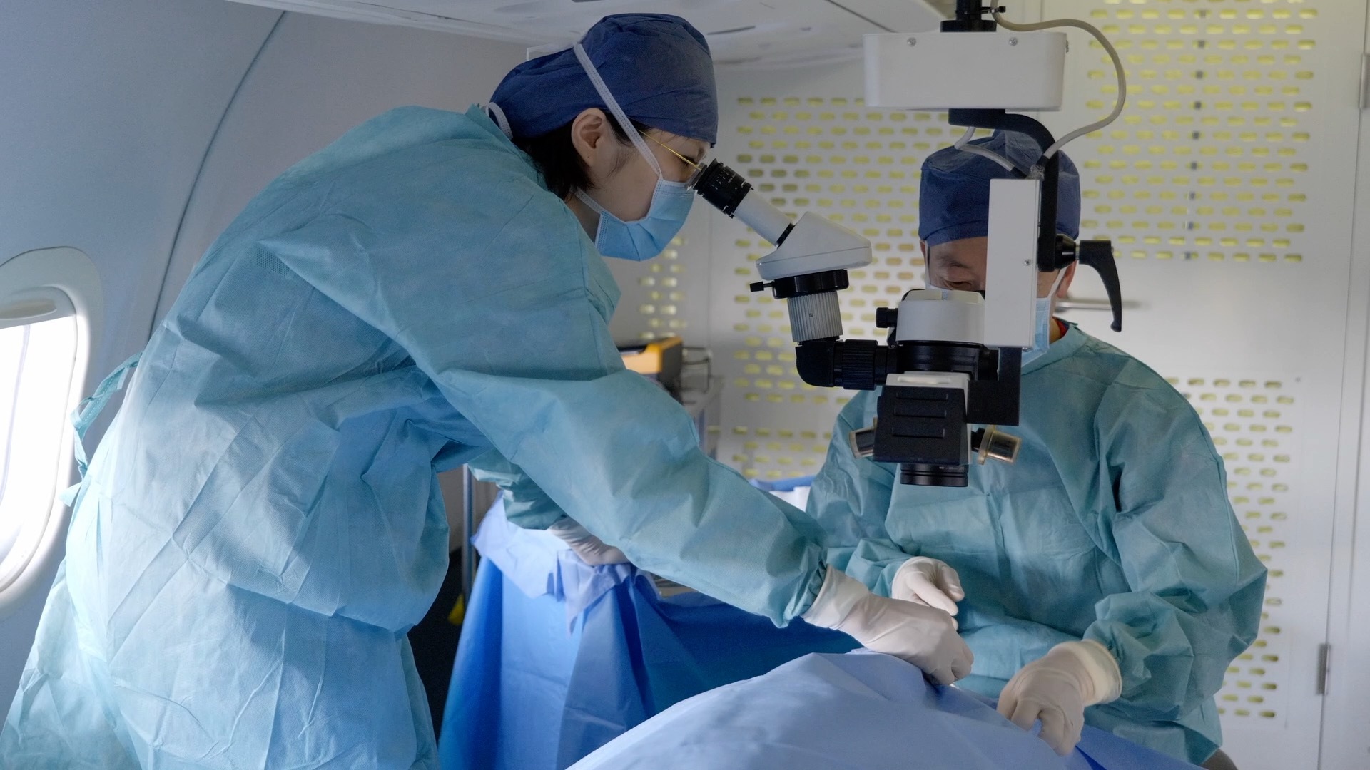 An eye surgery is underway onboard China's C909 airplane, Laos, February 10, 2026. /CMG