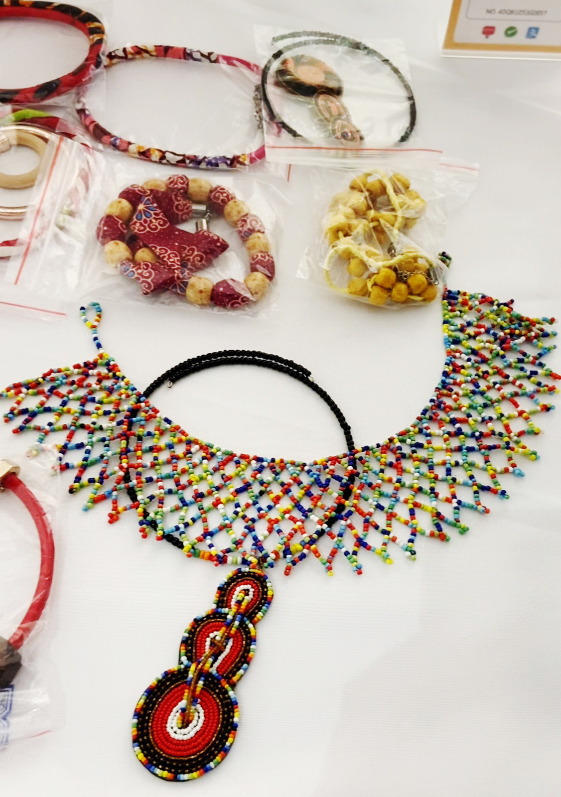 Products from Africa are seen at an international temple fair at the Beijing Olympic Museum. /CGTN