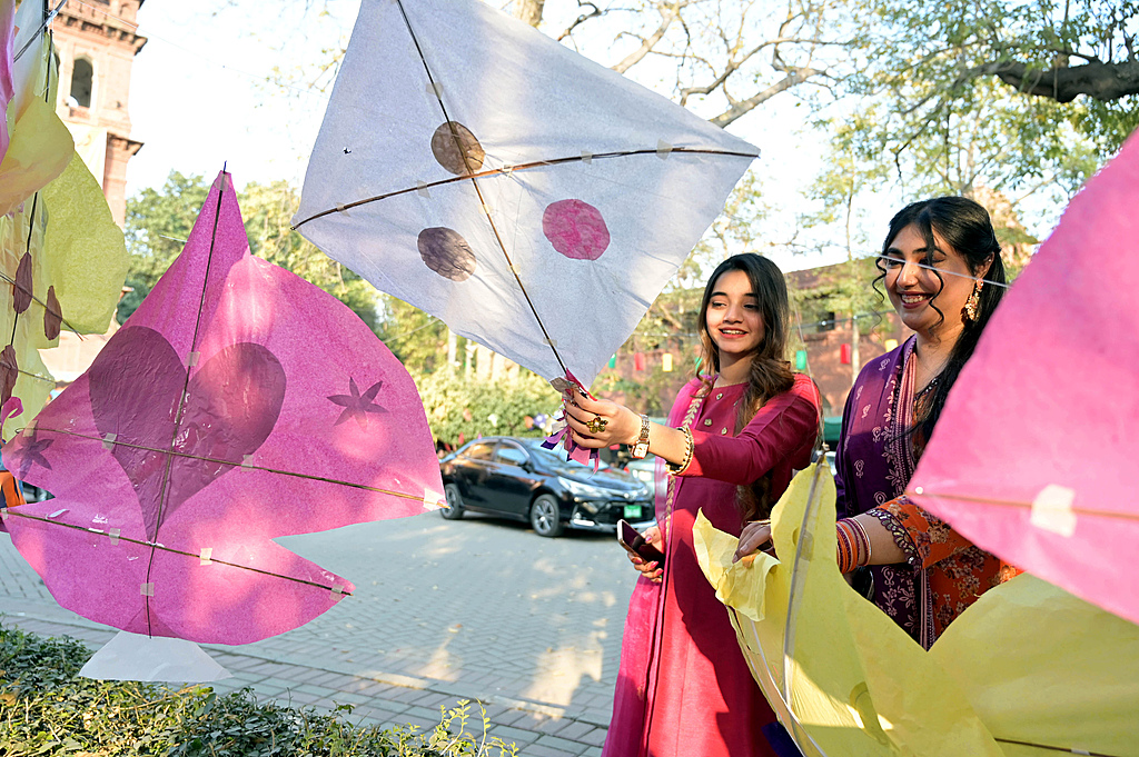 Women prepare to fly kites to celebrate the Basant festival and welcome the spring season, Lahore, Pakistan, February 6, 2026. /CFP