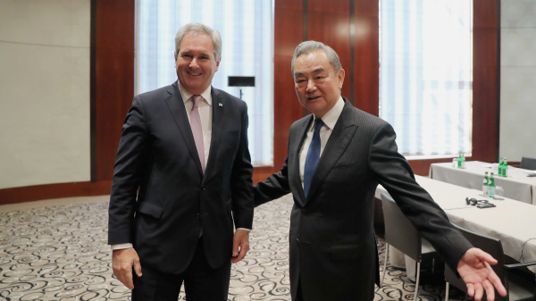 Chinese Foreign Minister Wang Yi met Argentine Foreign Minister Pablo Quirno during the Munich Security Conference on Friday. /Chinese Foreign Minister