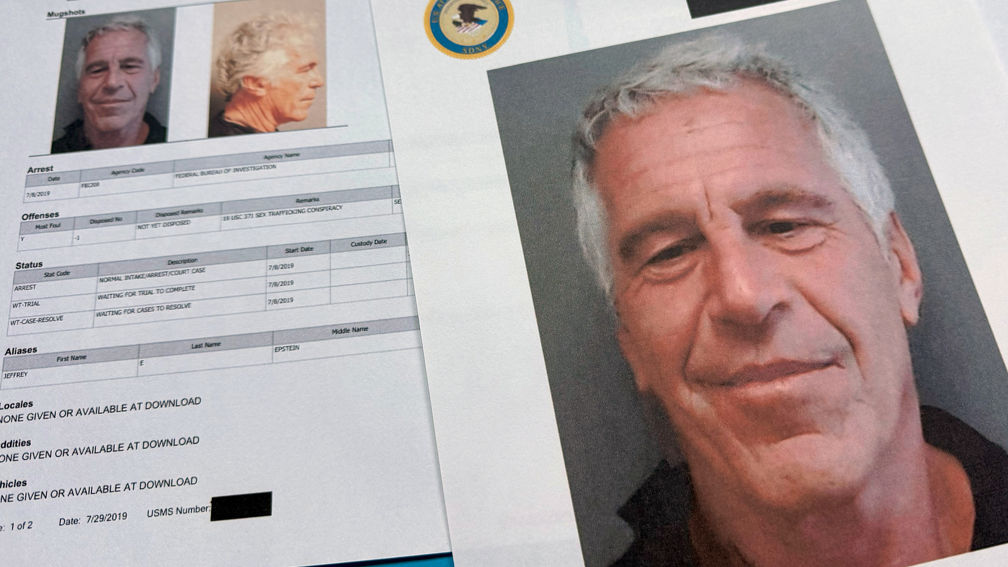 Documents that were included in the U.S. Department of Justice release of the Jeffrey Epstein files are photographed, January 2, 2026. /CFP