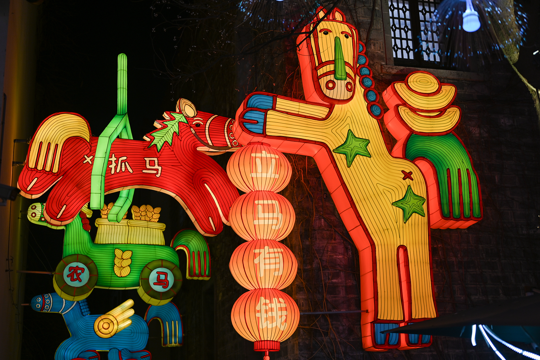 The zodiac horse lanterns are exhibited in the Laomendong street area of Nanjing, Jiangsu Province, February 11, 2026. /VCG