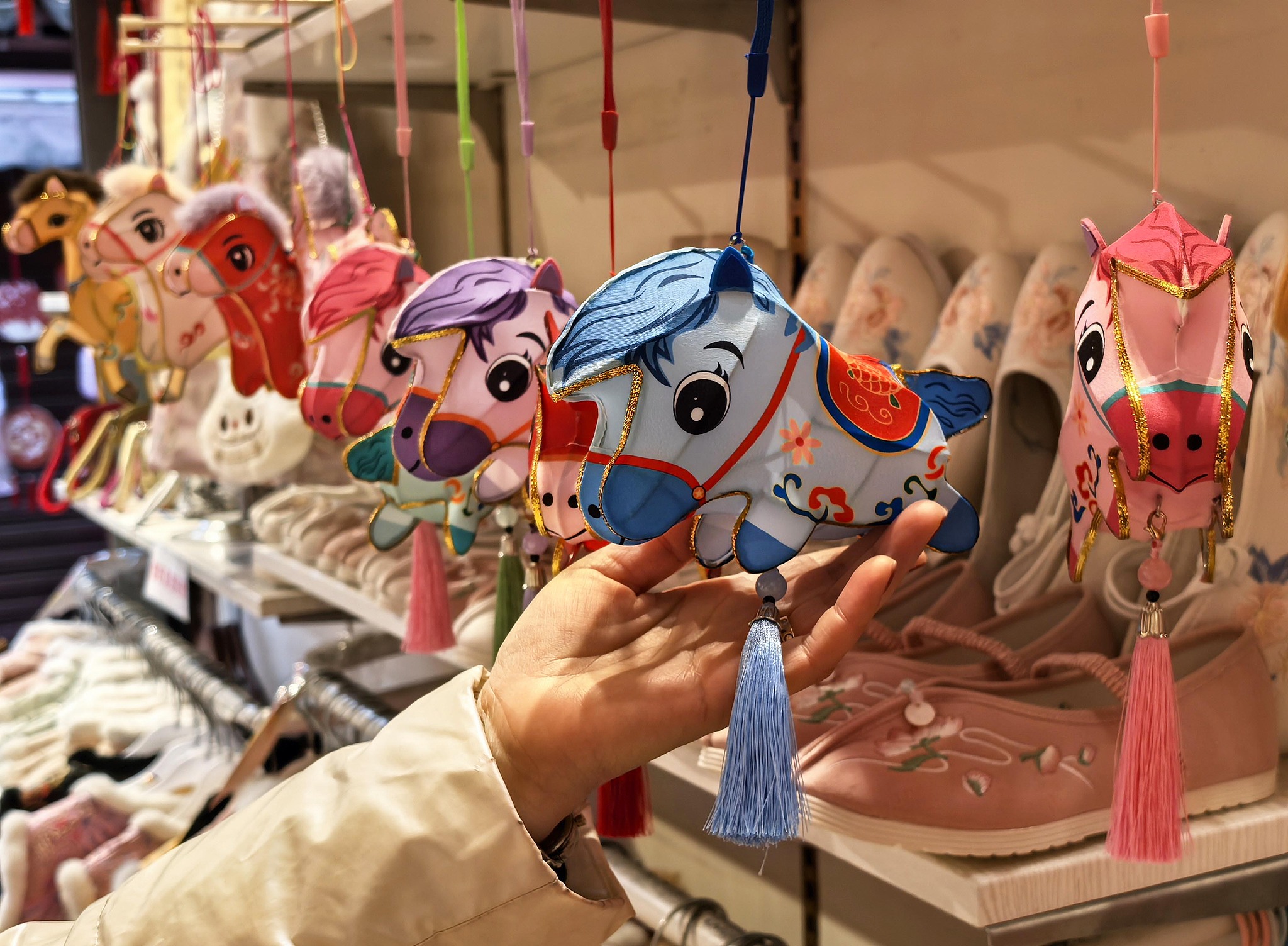 Horse-shaped lanterns are on display in a shop to welcome the Year of the Horse, in Nanjing, Jiangsu Province, February 10, 2026. /VCG