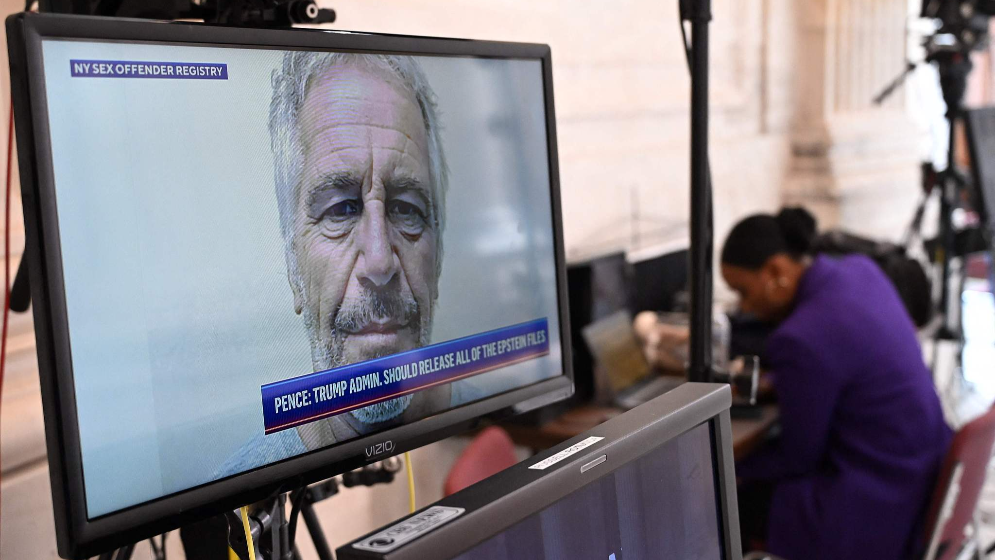 A mugshot of Jeffrey Epstein is seen on a television at the U.S. Capitol in Washington, D.C., July 16, 2025. /CFP
