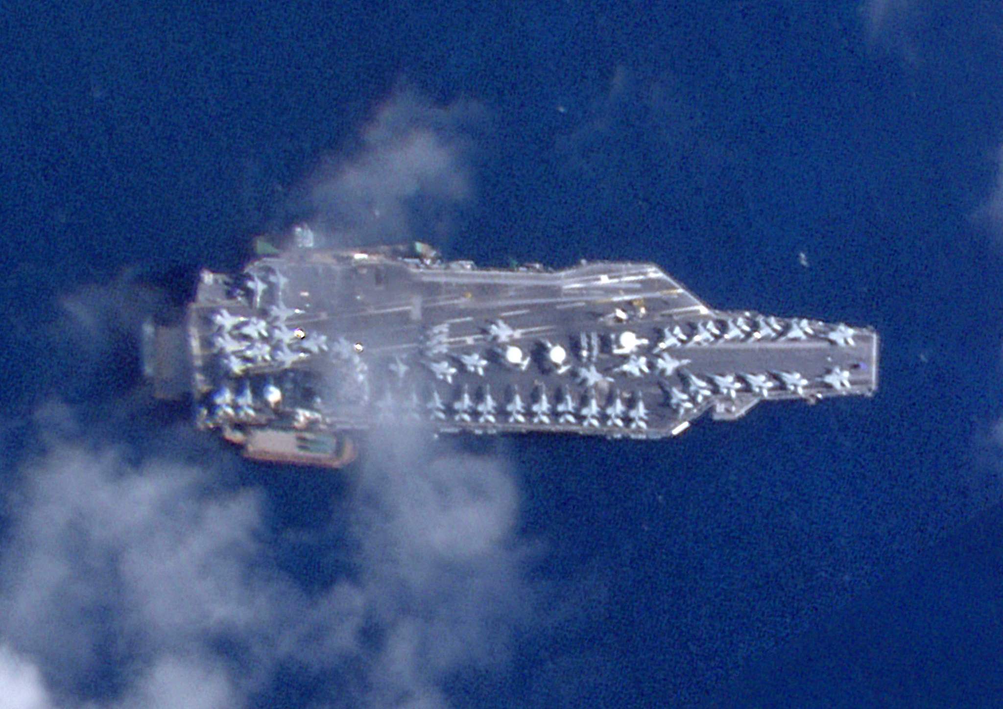 A satellite photo showing the world's largest aircraft carrier, the USS Gerald Ford, with at least 40 fighter jets on its deck, off the coast of Saint Thomas, U.S. Virgin Islands. December 3, 2025 /VCG