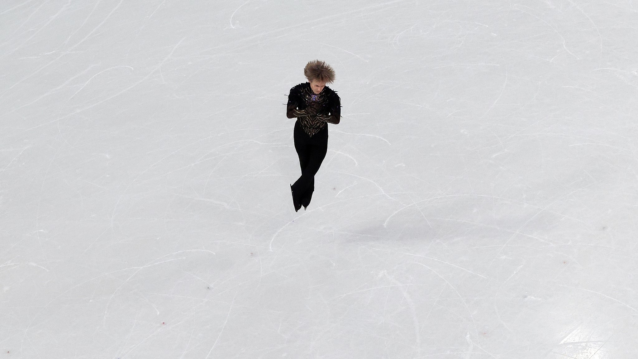 Ilia Malinin performs during the men's single figure skating free skating at the 2026 Milano Cortina Winter Olympics at the Milano Ice Skating Arena in Milan, Italy, February 13, 2026. /VCG