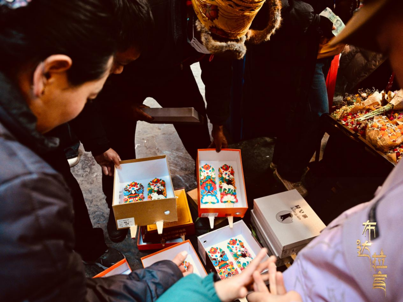 People pick out intangible cultural heritage butter sculptures in Lhasa, southwest China's Xizang Autonomous Region. /CGTN