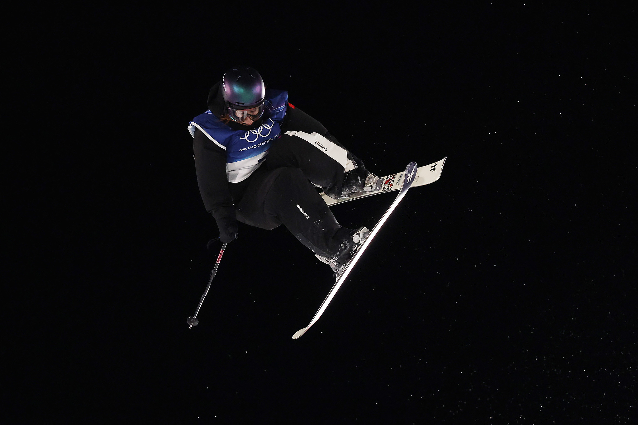 Liu Mengting of China competes in the women's freestyle skiing big air qualification round at the 2026 Milano Cortina Winter Olympics in Livigno, Italy, February 14, 2026. /VCG