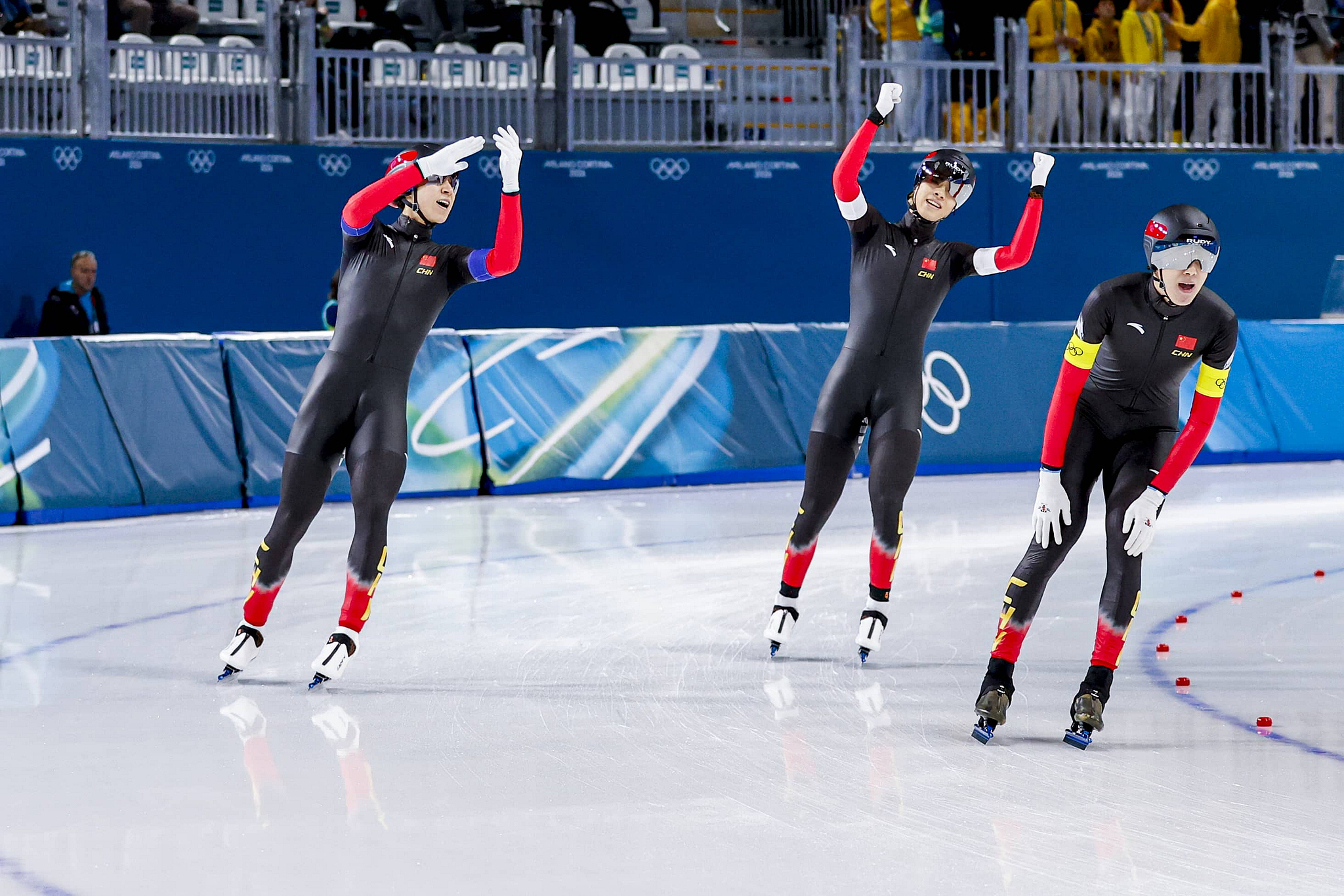 Team China celebrate after the speed skating men's team pursuit quarterfinals at the Milano Cortina 2026 Winter Olympics at Milano Speed Skating Stadium in Milan, Italy, February 15, 2026. /VCG