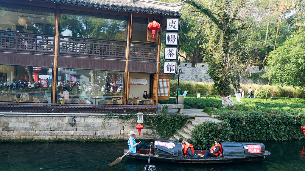 Tourists enjoying the scenic beauty along the city's canals while riding traditional boats in Shaoxing, Zhejiang Province, China, February 15, 2026. /VCG