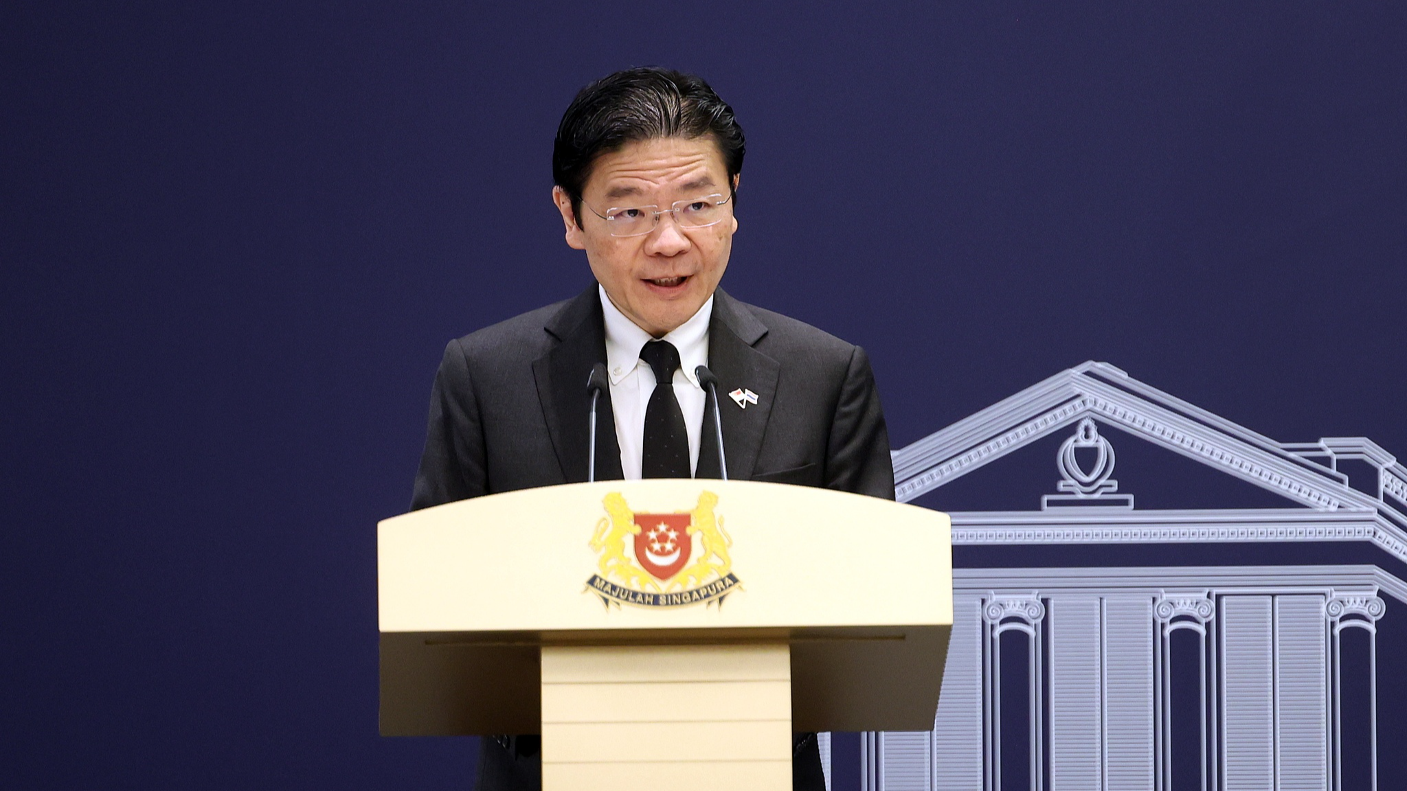 Singapore PM marks Total Defence Day, citing Japan's WWII invasion