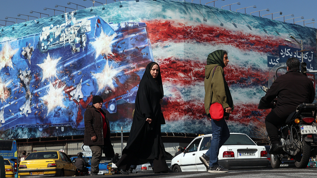 An anti-U.S. billboard at Enqelab Square in Tehran, Iran, February 16, 2026. /VCG
