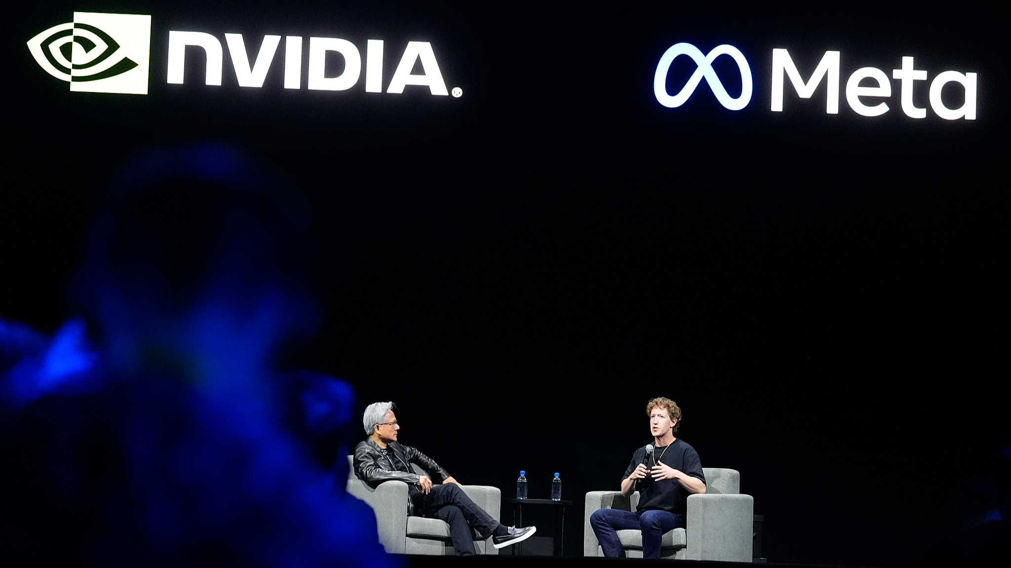 Nvidia chief executive officer Jensen Huang talks about artificial intelligence with Meta founder and CEO Mark Zuckerberg at SIGGRAPH 2024, the premier conference on computer graphics and interactive techniques, July 29, 2024. /VCG
