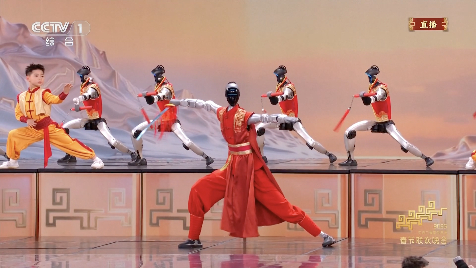 A team of humanoid robots joins forces with young kung fu artists to deliver a knockout martial arts performance during the China Media Group 2026 Spring Festival Gala, February 16, 2026. /CGTN