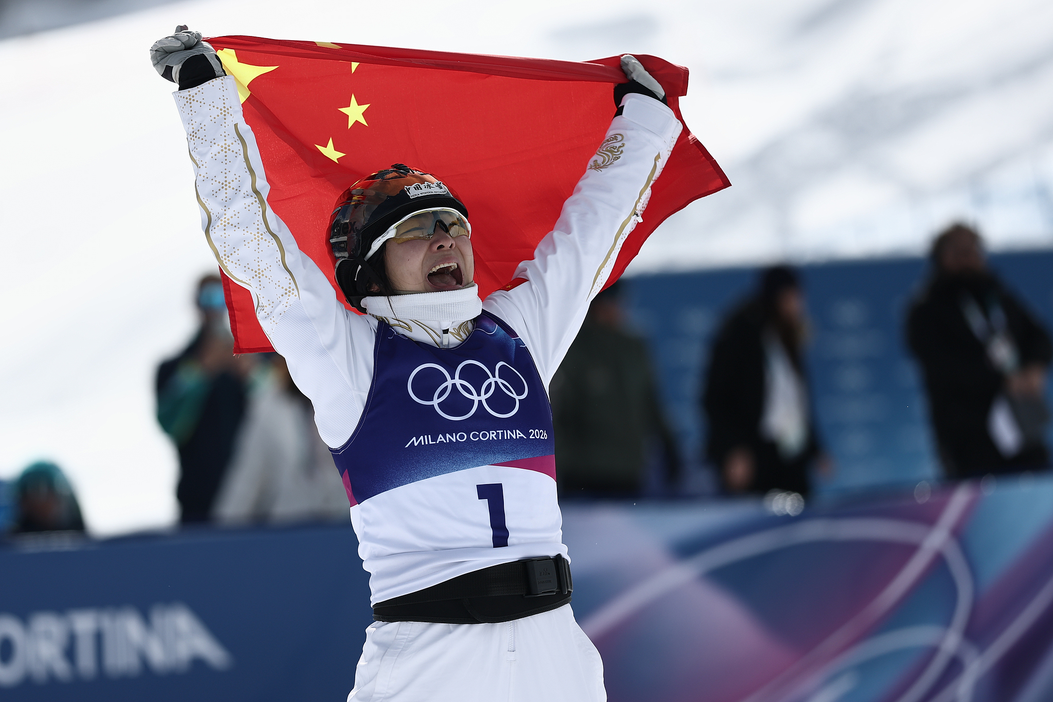 Xu Mengtao of China celebrates after winning the freestyle skiing women's aerials gold medal at the 2026 Milano Cortina Winter Olympics in Livigno, Italy, February 18, 2026. /VCG