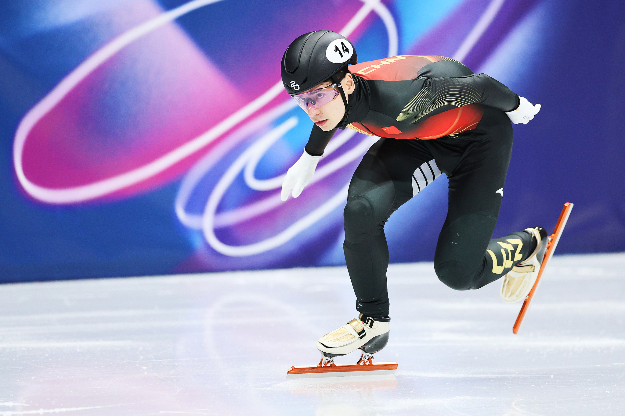 China's Liu Shaoang competes in the men's short track speed skating 500 meter 