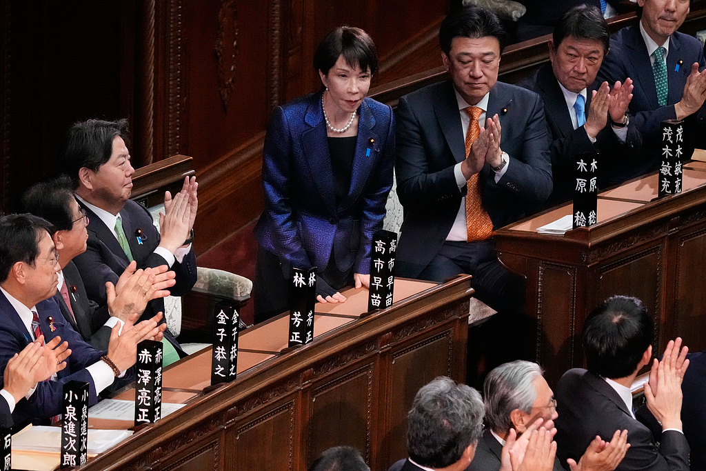 Members of the lower house of Japan's parliament applaud Sanae Takaichi’s re-election as prime minister during a special session of the House of Representatives in Tokyo, Japan, on February 18, 2026. /CFP