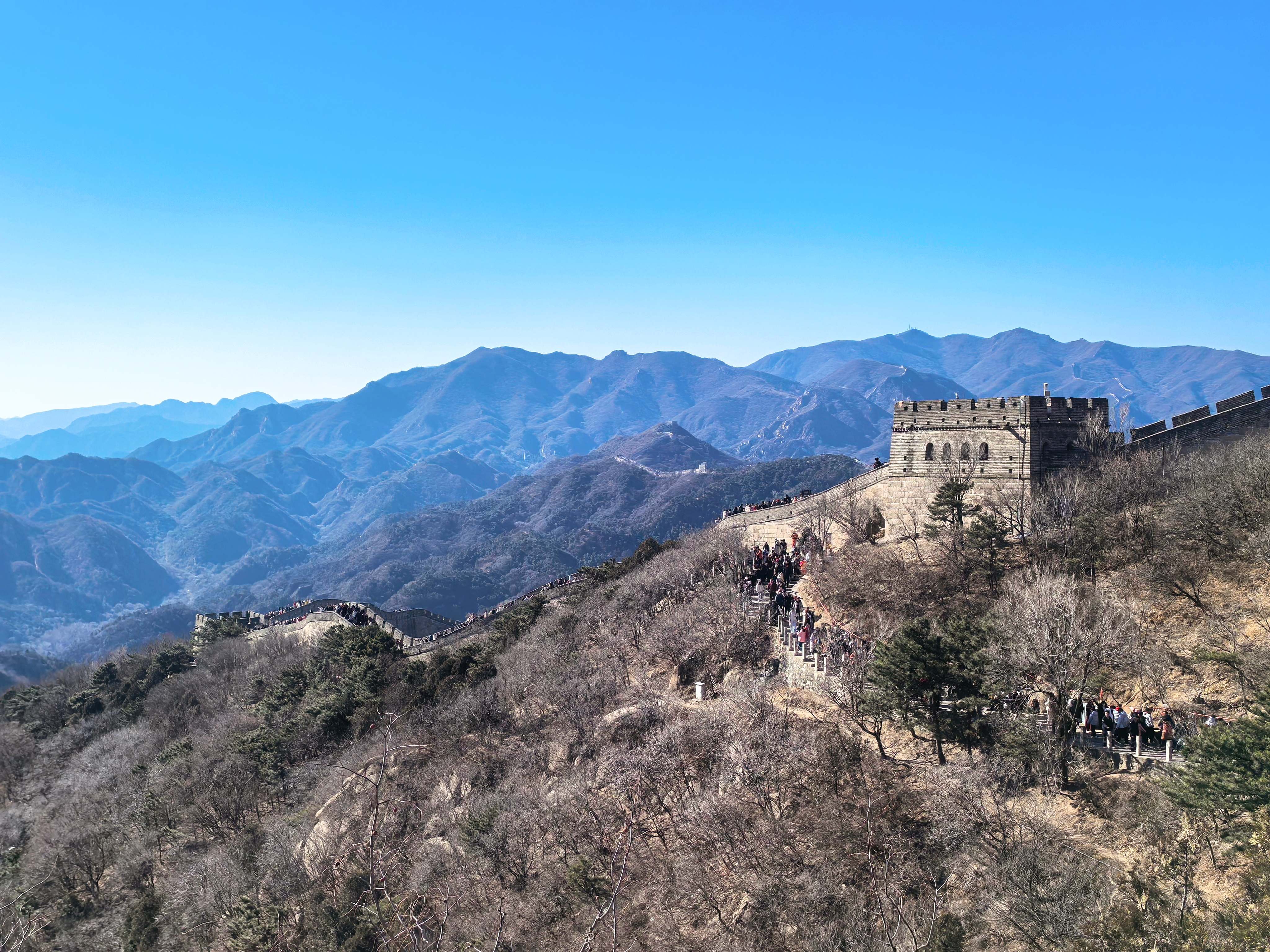 Visitors climb the Badaling Great Wall in Beijing on February 18, 2026. /CGTN