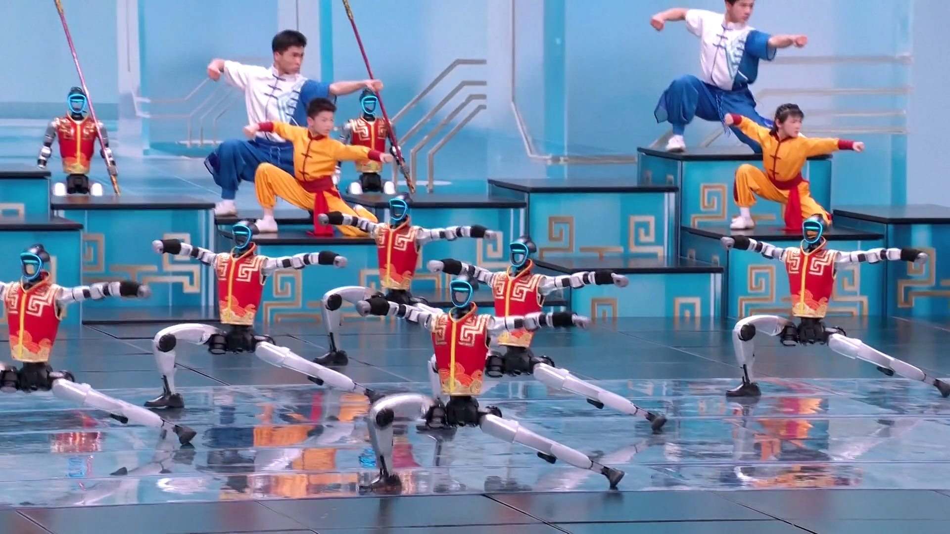 Humanoid robots perform martial arts on the stage of China Media Group's Spring Festival Gala, Beijing, China, February 16, 2026./ China Media Group