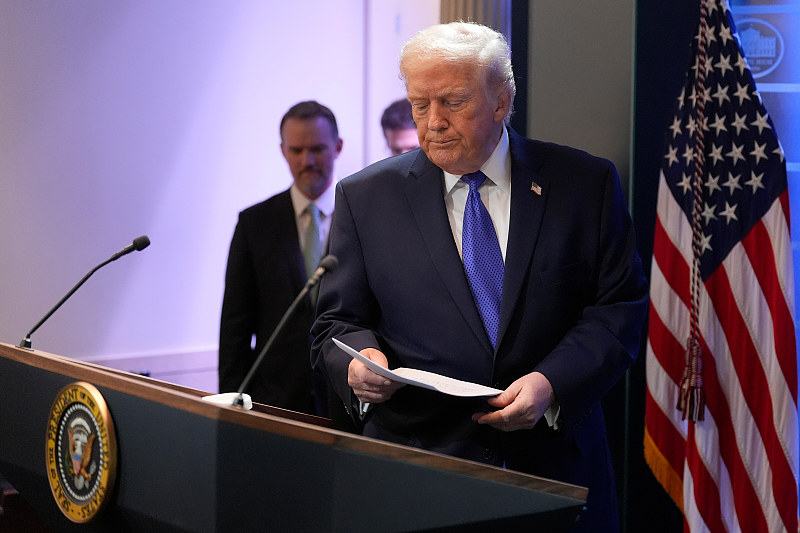 U.S. President Donald Trump walks up to the podium to speaks with reporters in the James Brady Press Briefing Room at the White House in Washington, D.C., February 20, 2026. /VCG