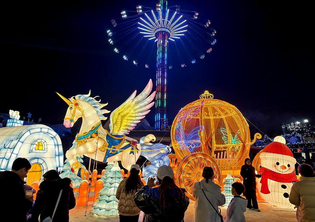 Visitors take photos at a Spring Festival lantern fair at a park in Shijingshan District, Beijing, capital of China, February 20, 2026. /VCG
