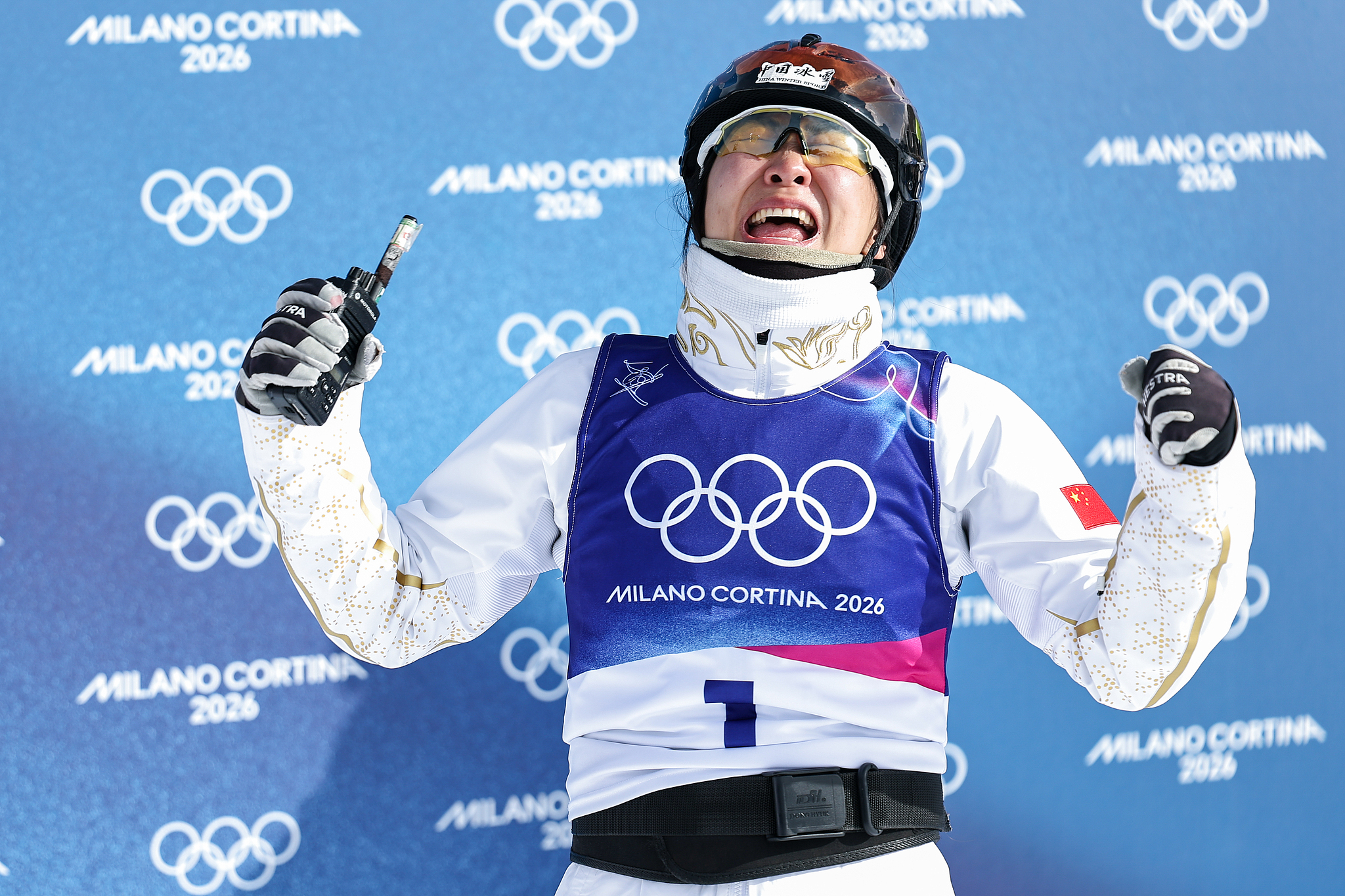 Xu Mengtao of China celebrates after winning the women's freestyle skiing aerials gold medal at the 2026 Milano Cortina Winter Olympics in Livigno, Italy, February 18, 2026. /VCG