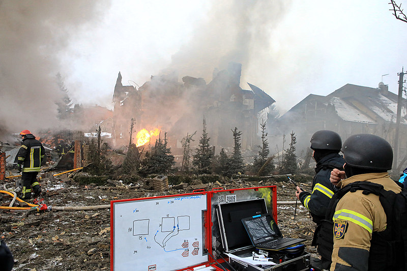 Rescuers coordinate their actions from a mobile operational headquarters set up in response to a Russian attack in Sofiivska Borshchahivka village, Kyiv region, Ukraine, February 22, 2026. /VCG