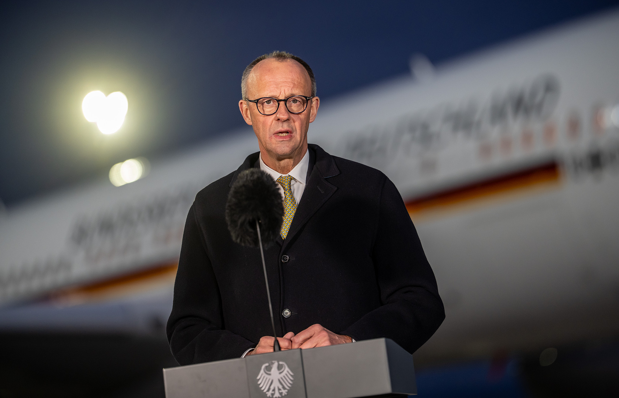 German Chancellor Friedrich Merz speaks during a press statement before his departure for China, February 24, 2026, Brandenburg, Schönefeld, Germany. /VCG