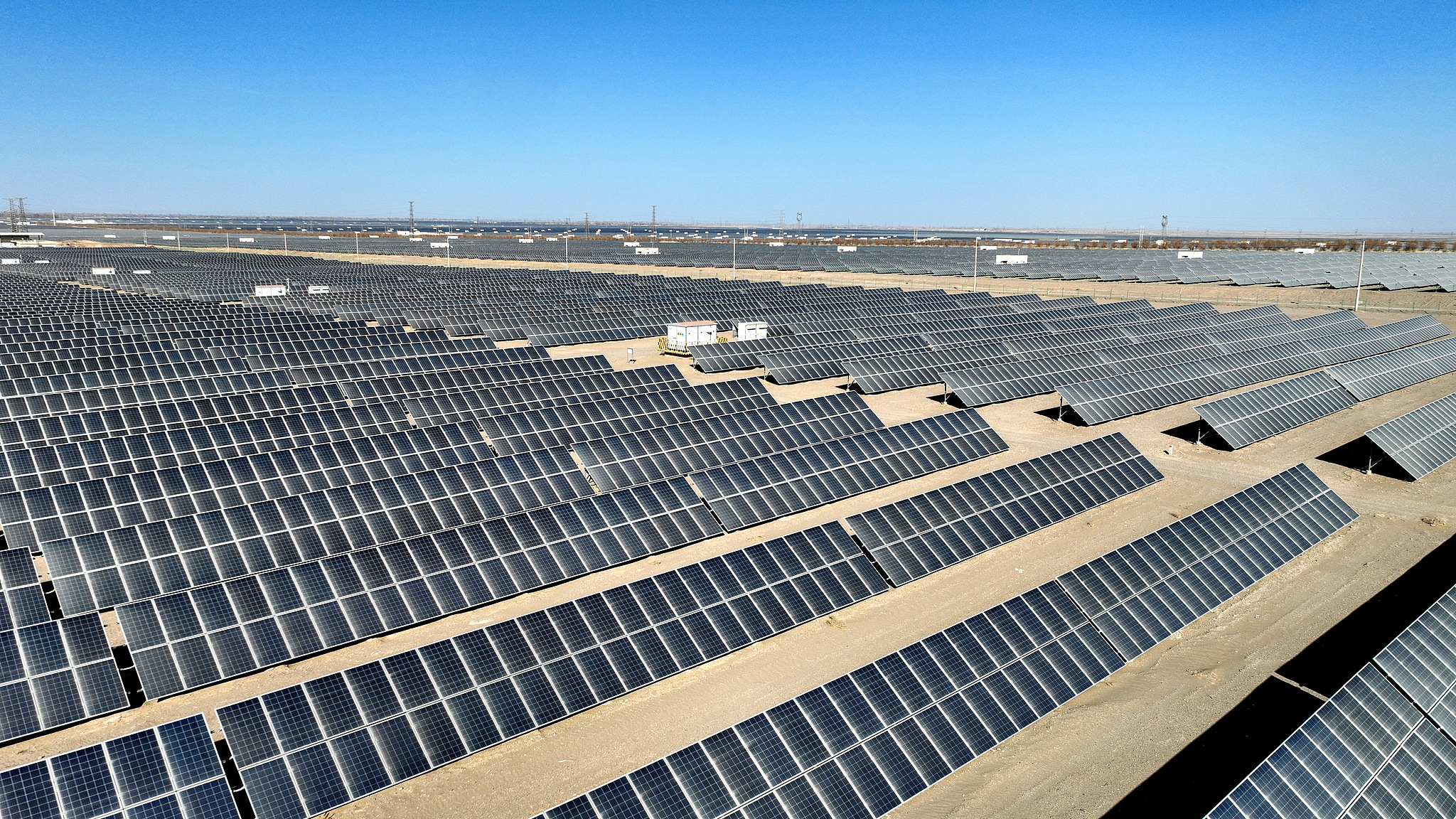 The photovoltaic power station in the industrial park operates smoothly, ensuring power supply during the Spring Festival, Jinta, Gansu Province, China, February 23, 2024. /VCG