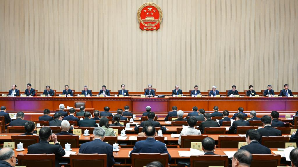Zhao Leji, chairman of the 14th National People's Congress (NPC) Standing Committee, presides over the first plenary meeting of the committee's 21st session at the Great Hall of the People in Beijing, capital of China, February 25, 2026. /Xinhua