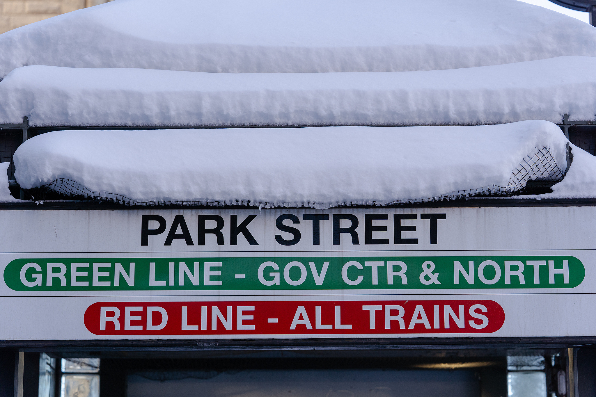 Snow accumulates on top of a sign to the Park Street station in Boston, Massachusetts, the U.S., February 24, 2026. /VCG