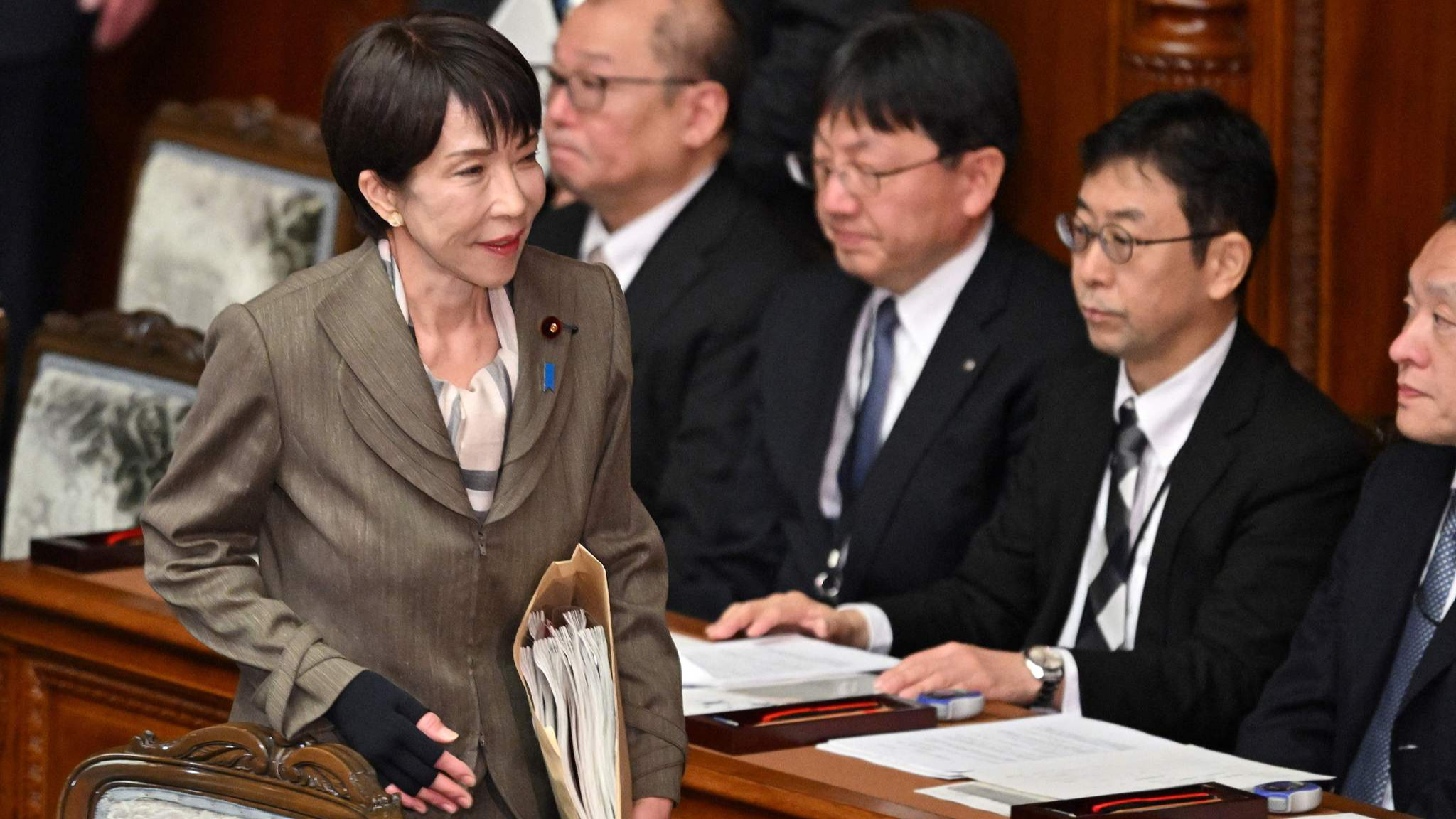 Japan's Prime Minister Sanae Takaichi (L) attends a plenary session of the House of Representatives in Tokyo, February 24, 2026. /VCG