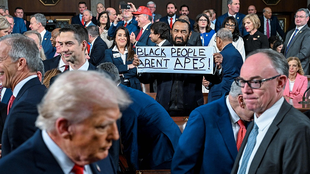 Democratic U.S. Representative Al Green holds a sign of protest before U.S. President Donald Trump delivers the State of the Union address in Washington, D.C., U.S., February 24, 2026. /VCG 
