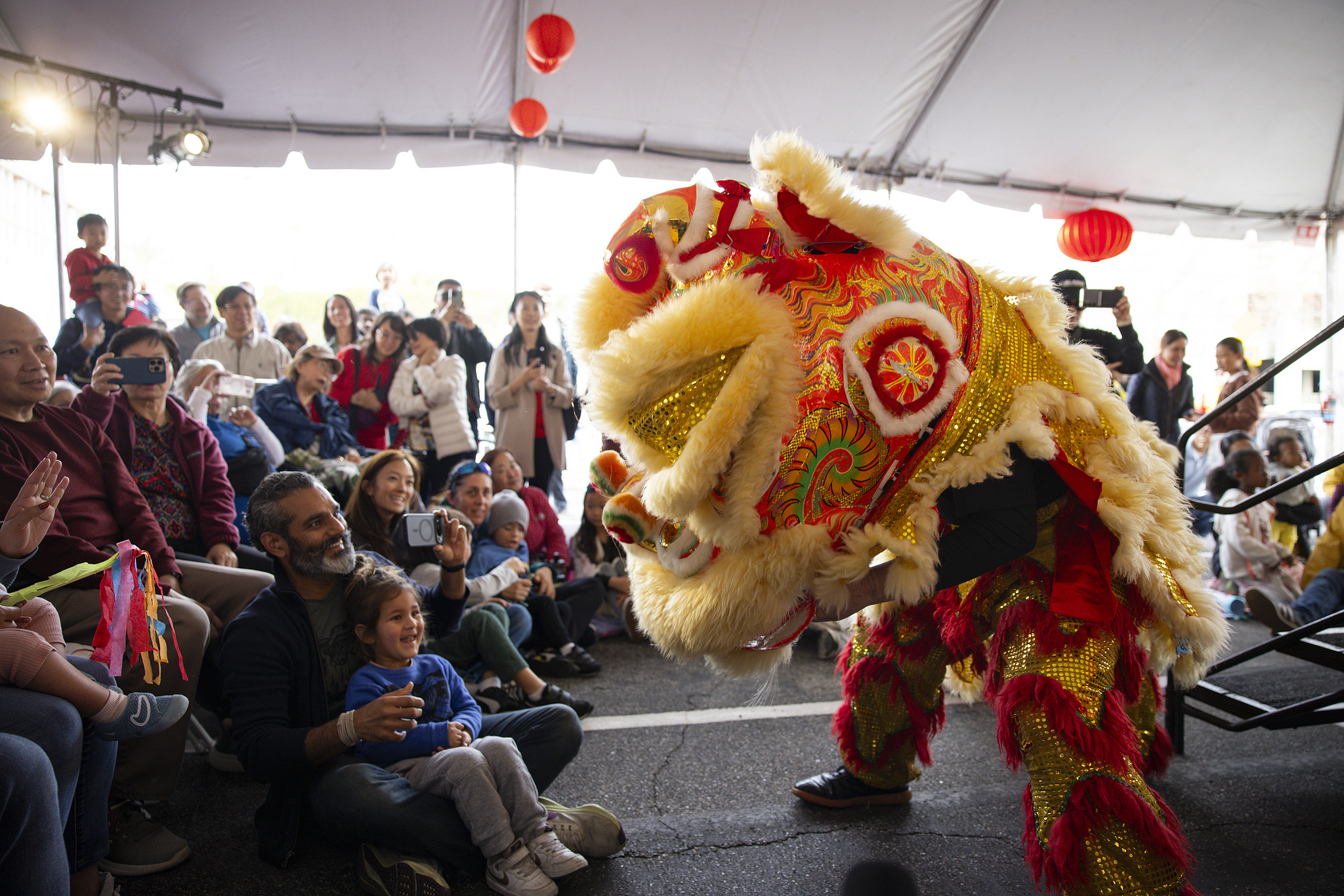 Visitors cheer for the Lion dancers during the University of Southern California Lunar New Year Festival at USC Pacific Asia Museum in Pasadena, California, February 15, 2026. /CFP